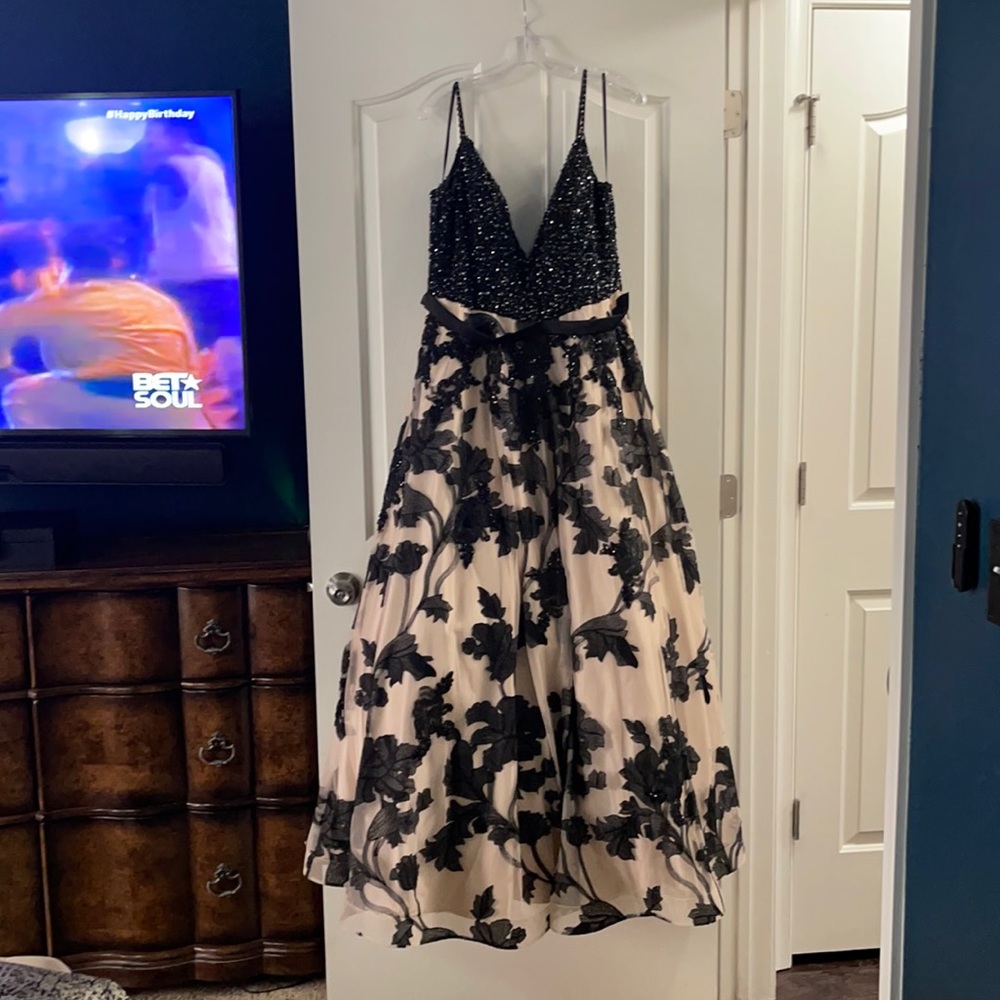 Black and Ivory Floral Side Pocket Ball Gown.